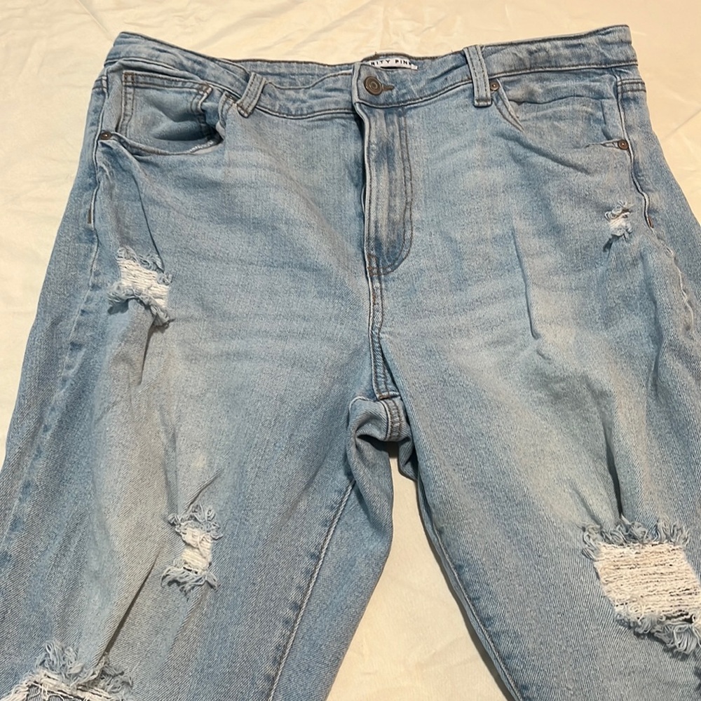 Celebrity Pink ripped jeans